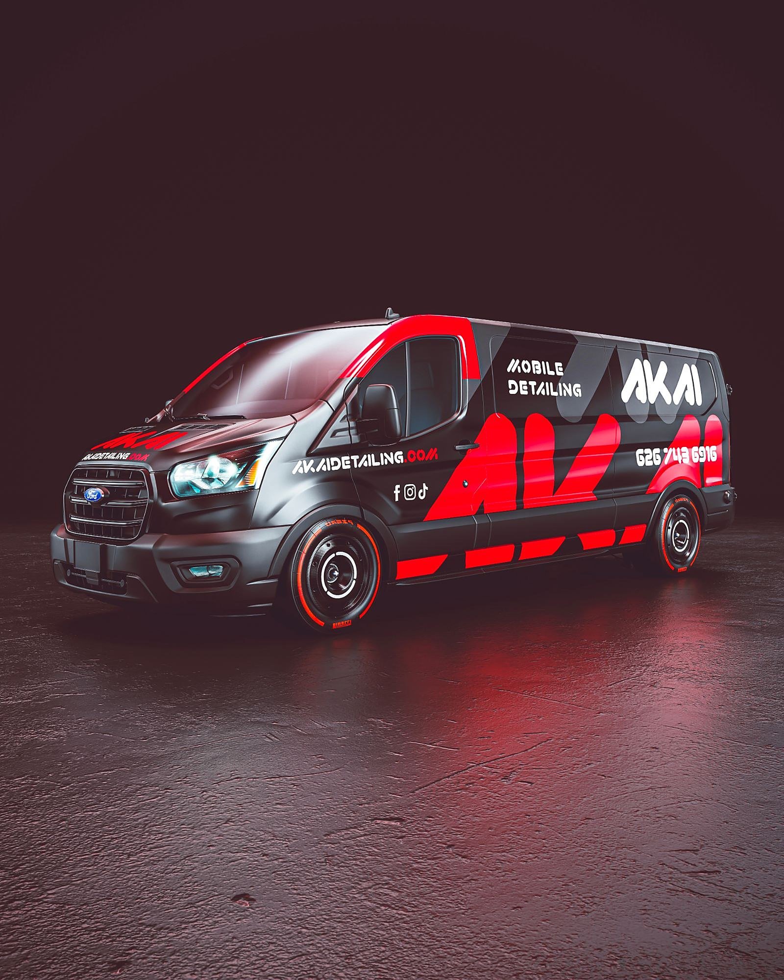 The AKAI Mobile Detailing van, black with a red and white wrap, shown at a three-quarter angle against a dark studio backdrop.